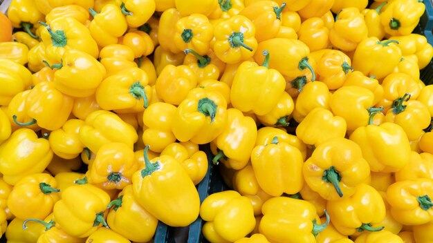 Pepper background yellow peppers close up