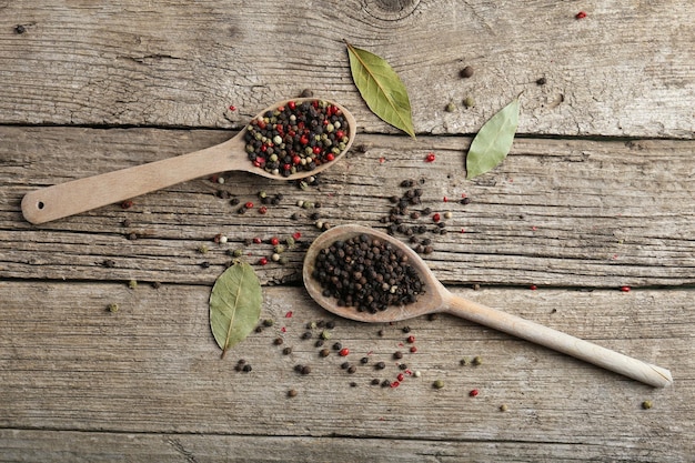 Pepper peas on wooden background