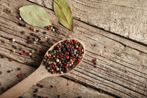 Pepper peas on wooden background