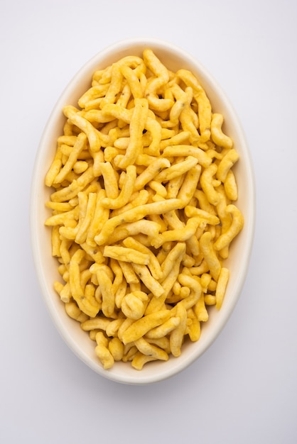 Pepper Sev mota shev, south indian snacks consisting of small pieces of crunchy noodles made from chickpea flour or besan paste, which are seasoned with turmeric