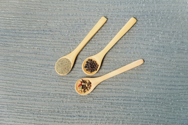 Pepper in wooden spoon