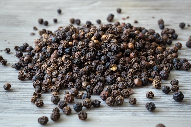 Peppercorns from a black pepper plant Piper nigrum