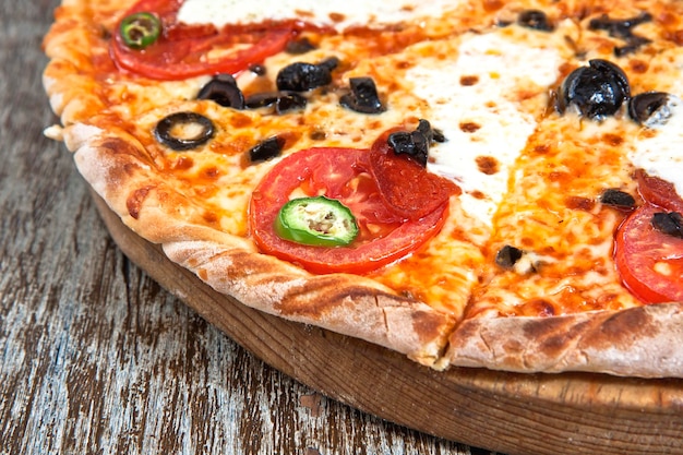 Pepperoni pizza black olives and tomato food gastronomy