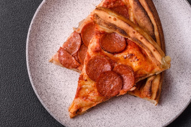 pepperoni pizza with sausage mozzarella cheese tomatoes salt and spices