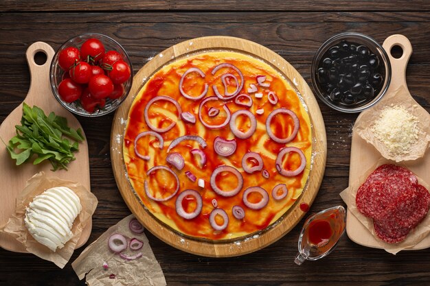  Pepperoni pizza on wooden board top view