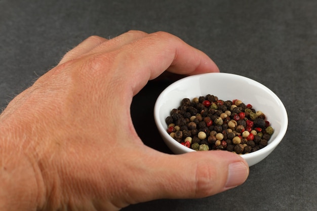 Peppers mix seasoning in hand