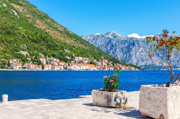 Perast old town view from the pier of the Our Lady on the rock island Kotor Montenegro