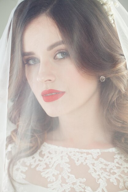 Perfect bride in veil face closeup