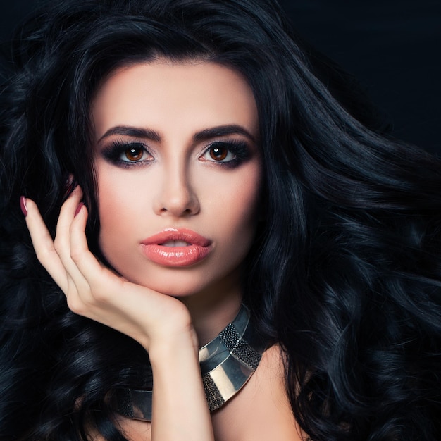 Perfect Brunette Woman with Hairstyle, Makeup, Healthy Skin. Beautiful Face Close up