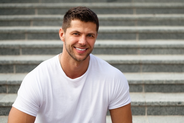 Perfect teeth. Man model posing