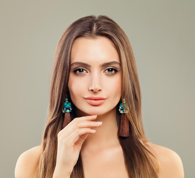 Perfect Woman Fashion Model with Jewelry Earrings