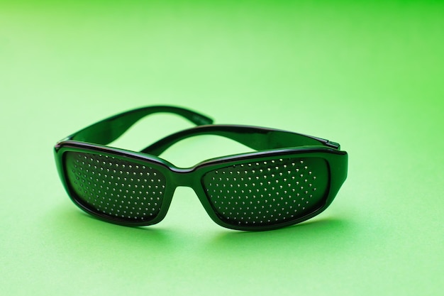 Perforated visual exercise glasses