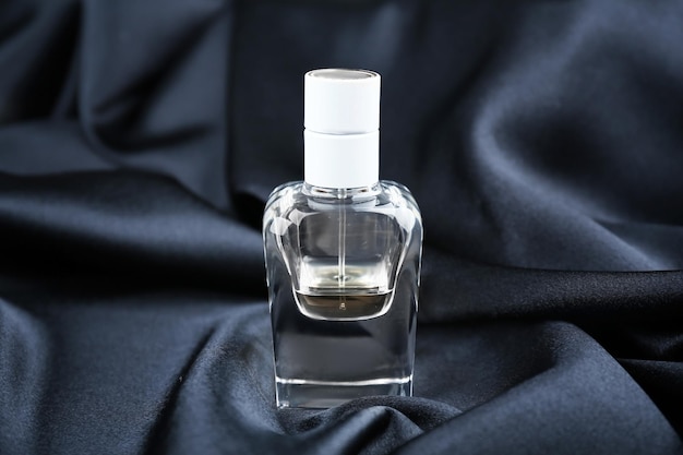 Perfume bottle on cloth