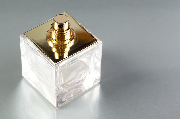 Perfume bottle on a dark background