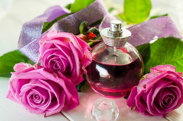 Perfume in a bottle of the scent of roses