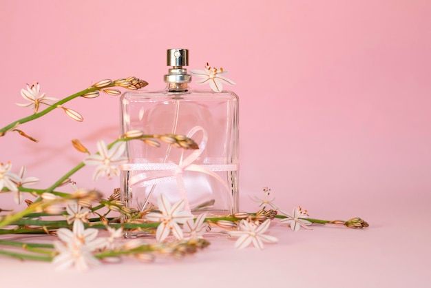 Perfume bottle with festive ribbon with ORNITHOGALUM flowers in pink color Gift card for Mothers D