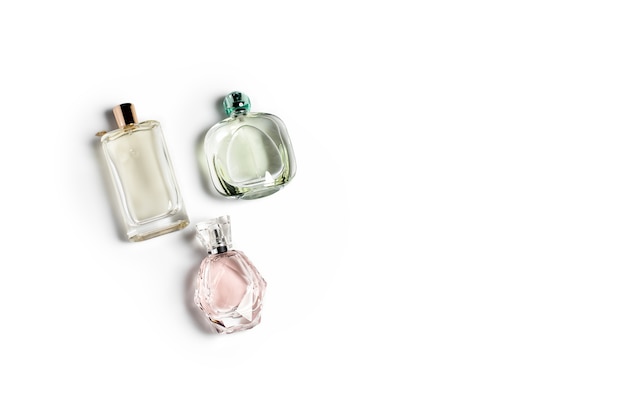 Perfume bottles on light surface