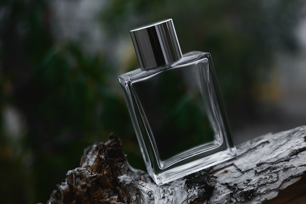 Perfume on green nature surface