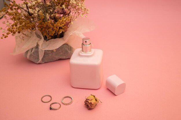 Perfume on a pink background