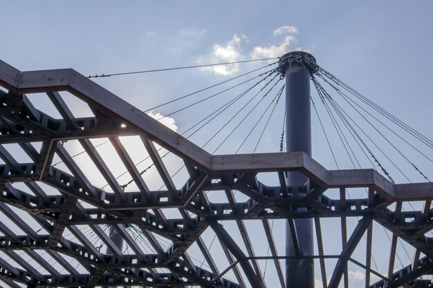 Pergola canopy, structural elements. An architectural structure of repeating arches to protect visitors from the sun. Renewed entrance lobby in Kiev on Trukhanov Island after reconstruction.