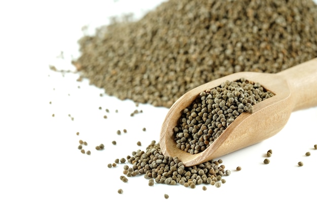 Perilla frutescens or sesame in wood spoon on white background.