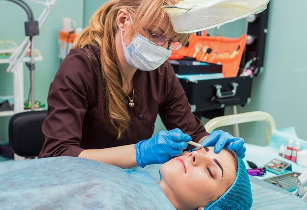 Permanent eyebrow make up.