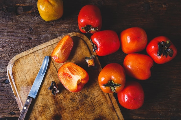 Persimmons on a cutting board