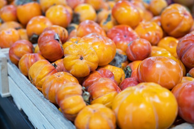 Persimmons fruit at the market