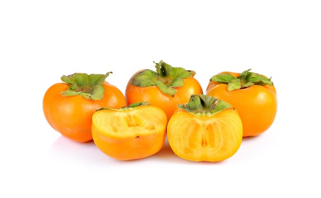 Persimmons on white