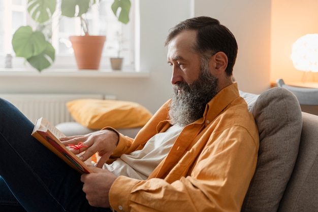 Photo person doing day-to- day activity while waring string on finger to remember something important