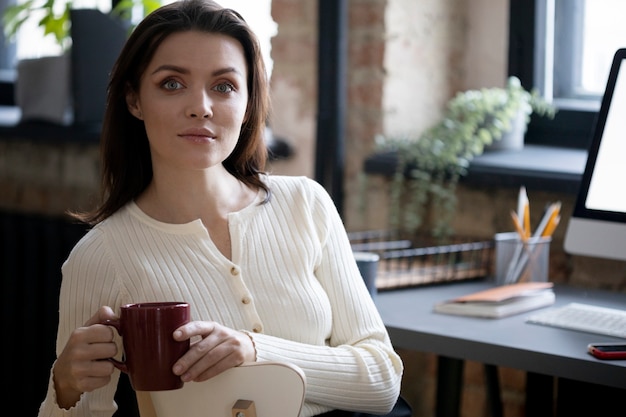 Photo person drinking beverage while in break time