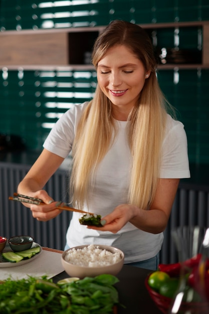 Photo person eating seaweed snacks