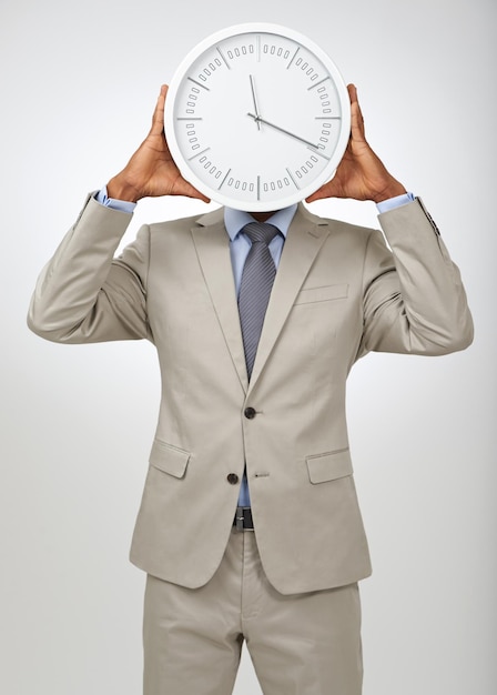 Person face and business or clock for deadline as law attorney for corporate overtime punctual or hurry Employee hands and white background in studio as mockup for hour schedule pressure or late