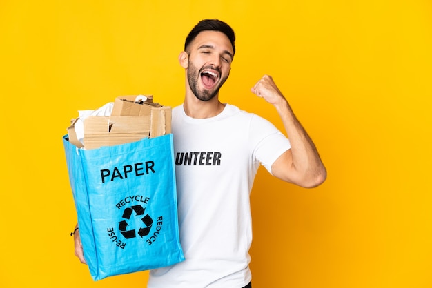 Person holding a bag to recycle