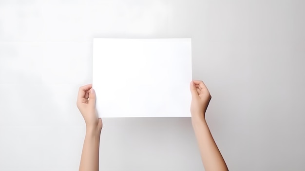 A person holding a blank sheet of paper.