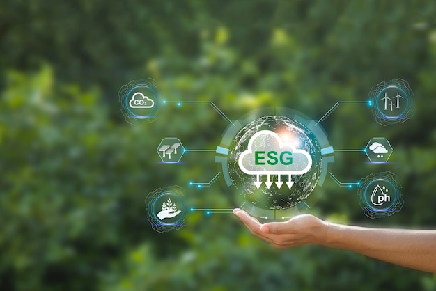 A person holding a cloud with the word esg on it