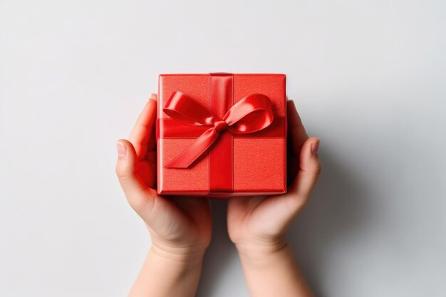 Person holding a gift box symbolizing a sign up bonus for christmas