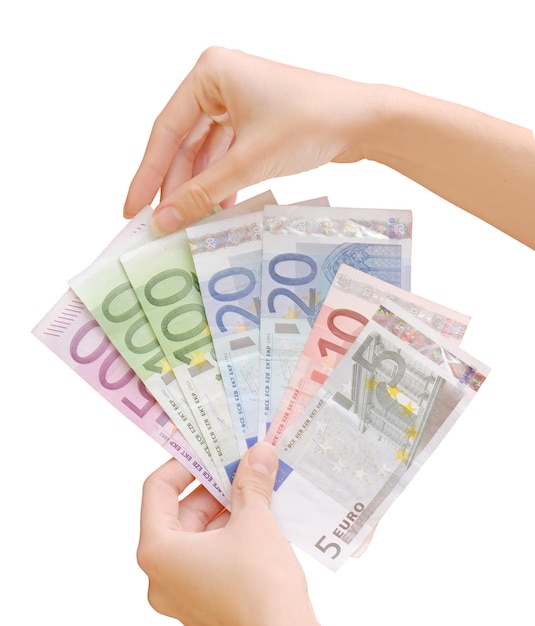 A person holding a stack of euro banknotes.