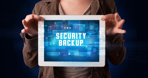 Person holding tablet security concept