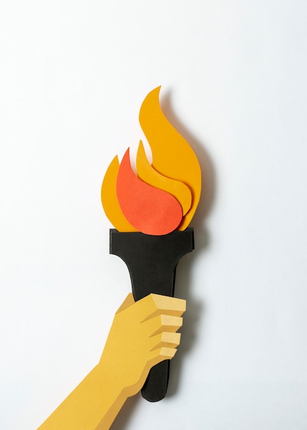 Person holding torch in paper style