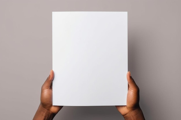 a person holding a white paper in their hands