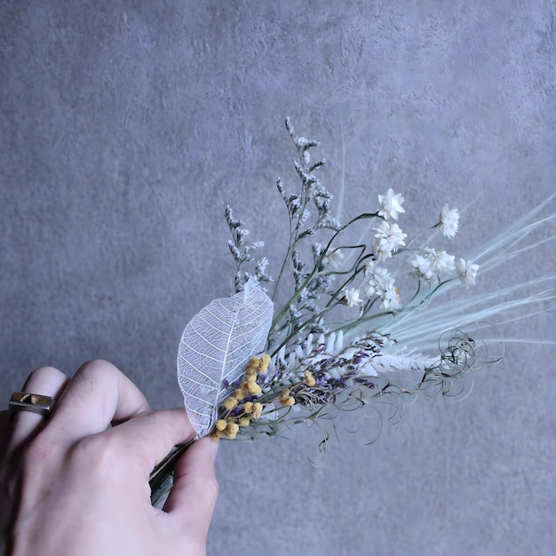 Photo a person holds a flower that has the word quot on it quot