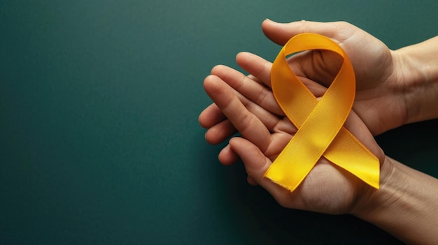 Photo person holds yellow ribbon in their hands