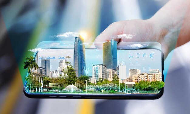 a person is holding a tablet with a picture of a city in the background