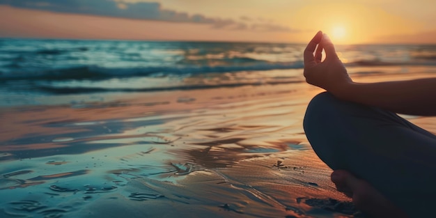 A person meditating by the beach at sunset emphasizing the importance of relaxation