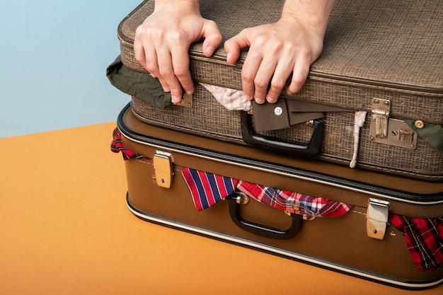 Photo person packing suitcases for travel