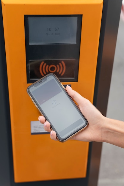 Person paying with its smartphone wallet app