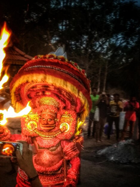 Person performing traditional dance on field