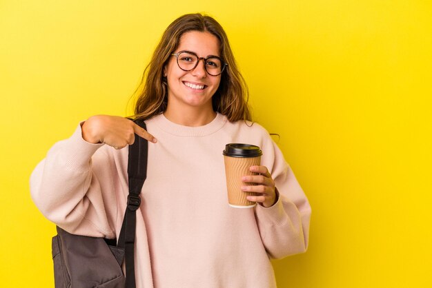 Person pointing by hand to a shirt copy space proud and confident