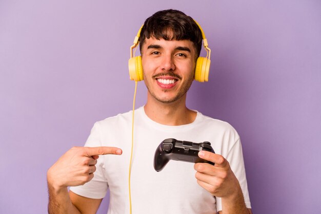 Person pointing by hand to a shirt copy space proud and confident